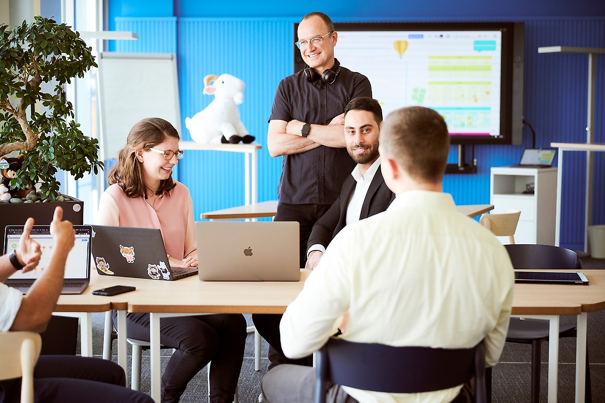 Employees in conversation at the workplace