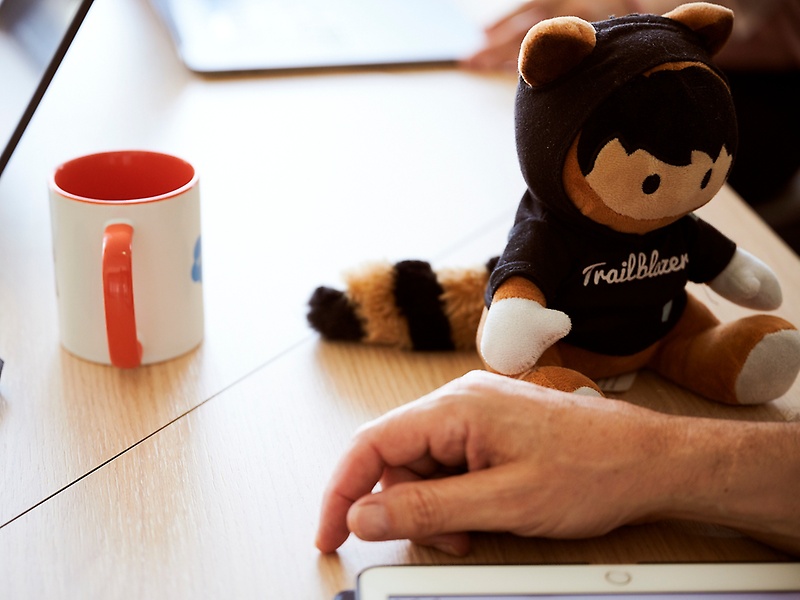 Salesforce mascott on a desk